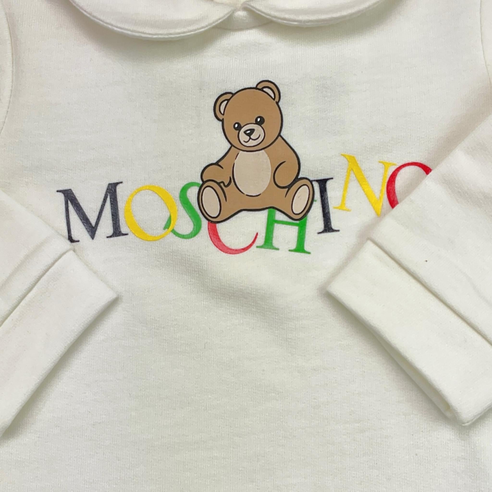 MOSCHINO tutina tinta unita con stampa Bianco per Neonato MMY06Z BIANCO MOSCHINO