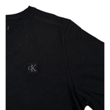 Calvin Klein T-Shirt Girocollo tinta unita con Logo Nero per Bambino IU0IU00543X NERO CALVIN KLEIN 