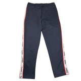 pantalone tuta tinta unita con profili logati