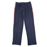pantalone tuta tinta unita con profili logati